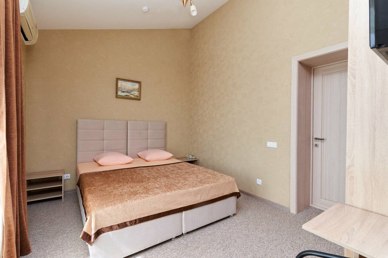 Фотографии номера Двухместный номер с 1 кроватью или 2 отдельными кроватями в Гостинице Юлиана Евпатория