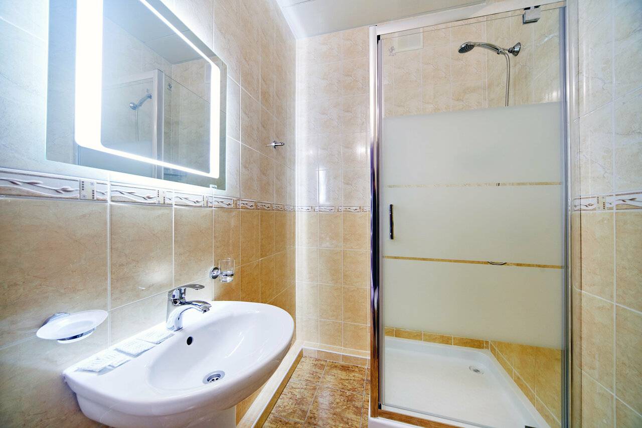 Фотографии номера Двухместный номер с 1 кроватью или 2 отдельными кроватями в Гостинице Юлиана Евпатория