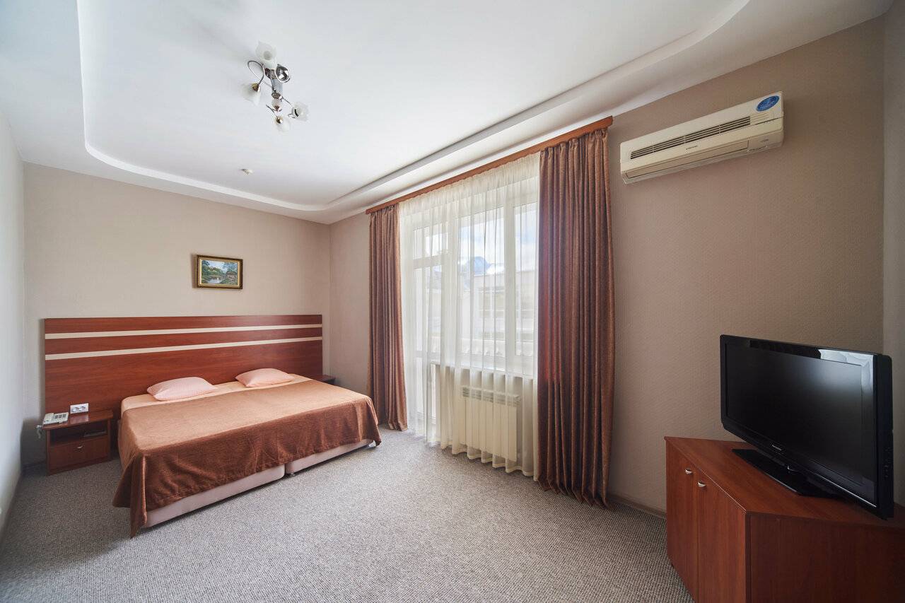 Четырехместный номер с балконом